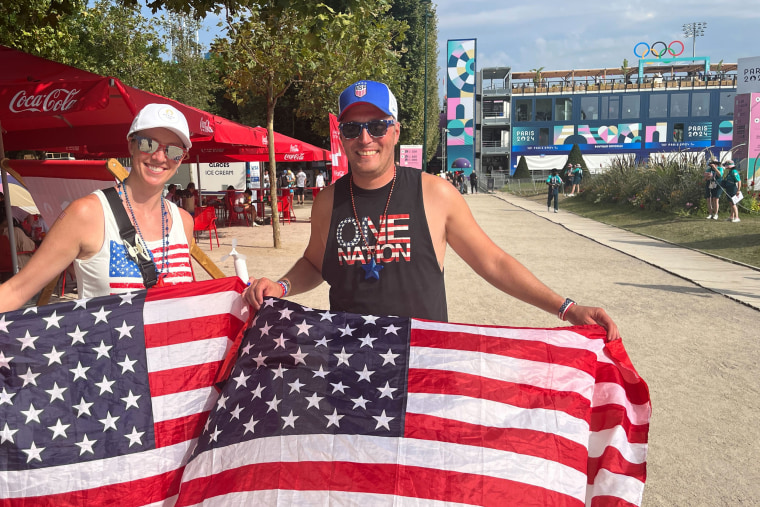Tiffany Thompson, 36, and Levi Overdorff, 34, of Pittsburgh, at the Eiffel Tower Stadium to watch beach volleyball Tuesday.
