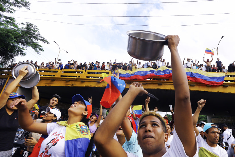 Protests erupted in parts of Caracas Monday against the re-election victory claimed by Venezuelan President Nicolas Maduro but disputed by the opposition and questioned internationally, AFP journalists observed. 