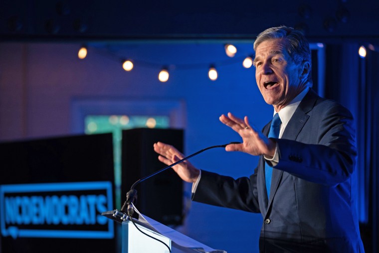  Roy Cooper speaks to the crowd during an election night event