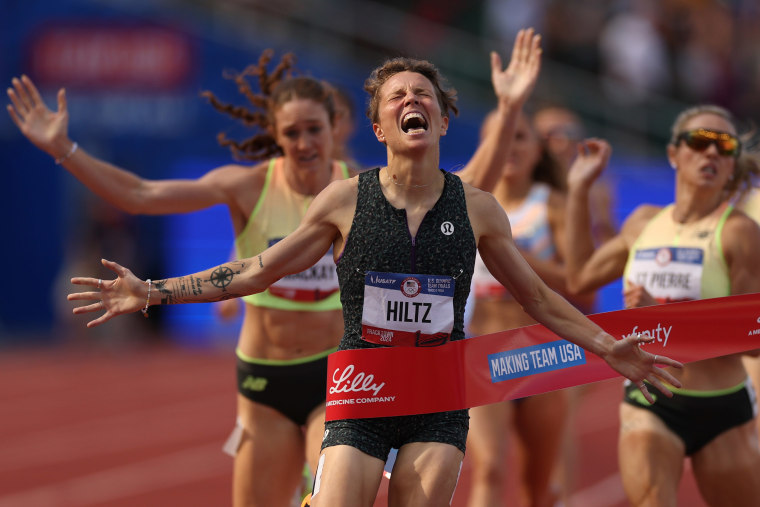 Nikki Hiltz celebrates crossing the finish line to win the women's 1500 meter final 