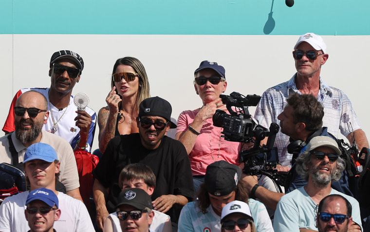 Snoop Dog, Leticia Bufoni, Doris Williams, and Christopher Meloni attend the Men's Street Finals on day three of the Olympic Games.