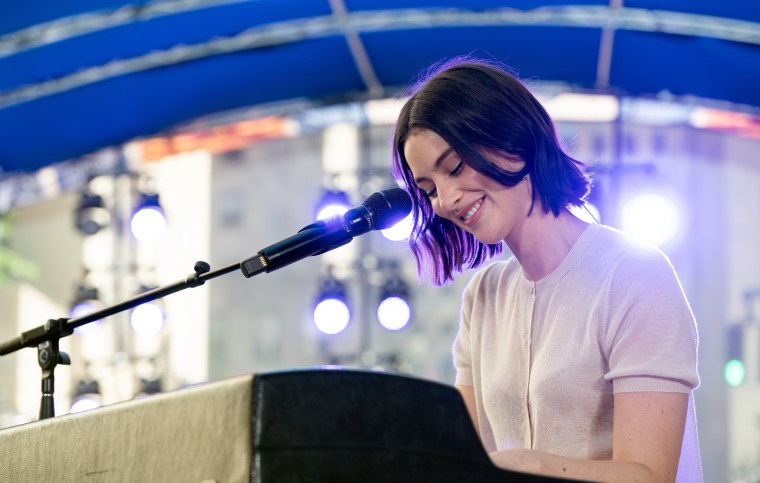 Gracie Abrams performing on the Plaza.