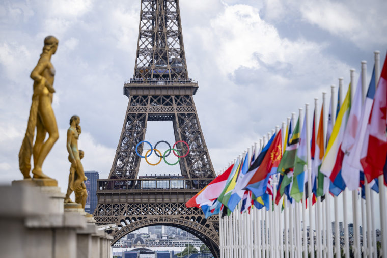 The Eiffel Tower with the Olympics rings pictured with national flags of competing countries from the Place du Trocadero ahead of Paris 2024 Olympic Games  on July 21, 2024 in Paris, France.