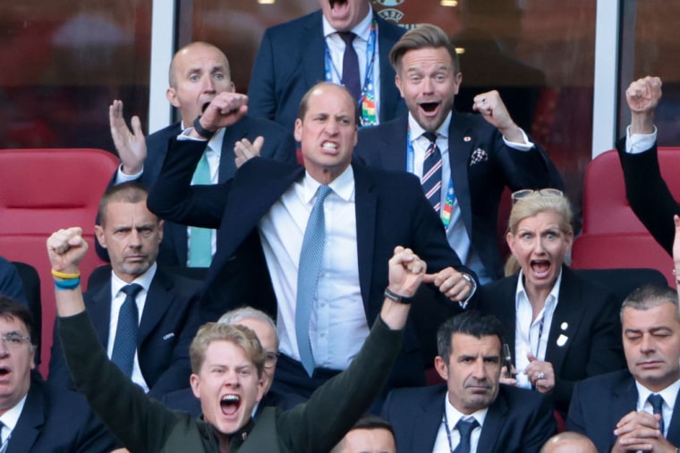 Prince William, Prince of Wales and FA President celebrates the goal of Bukayo Saka of England with FA Chair Debbie Hewitt