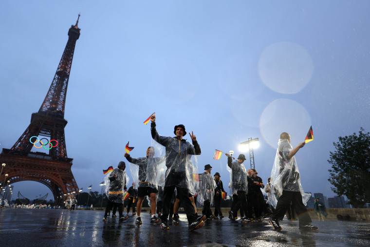 Team Germany walks toward the Place du Trocadero.