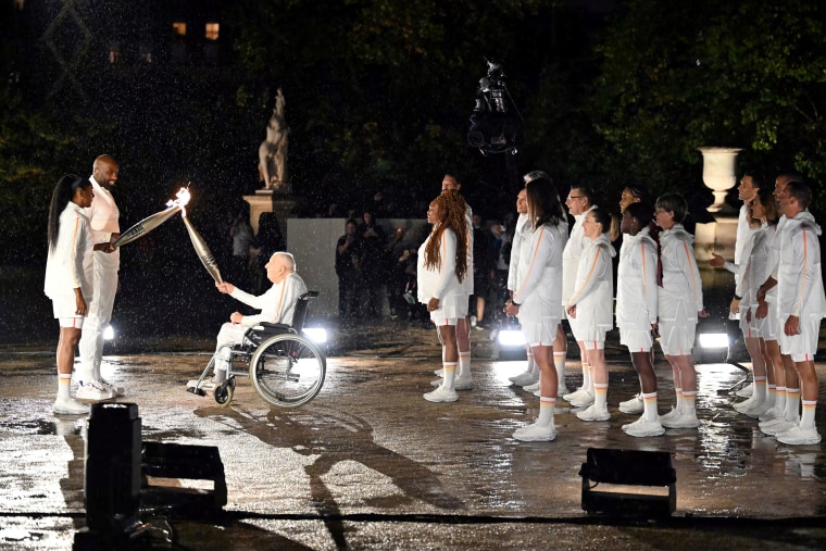 Who lit the Olympic flame in 2024 - Figure 1