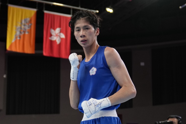 Taiwan's Lin Yu-ting poses after winning against India's Parveen in the Boxing Women's 54-57 kilogram semifinal bout during the 19th Asian Games in Hangzhou, China, on Oct. 4, 2023.