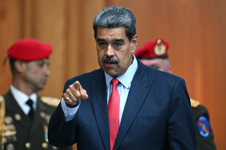 Venezuelan President Nicolas Maduro leaves a news conference about the presidential election at the Miraflores presidential palace in Caracas on July 31, 2024.