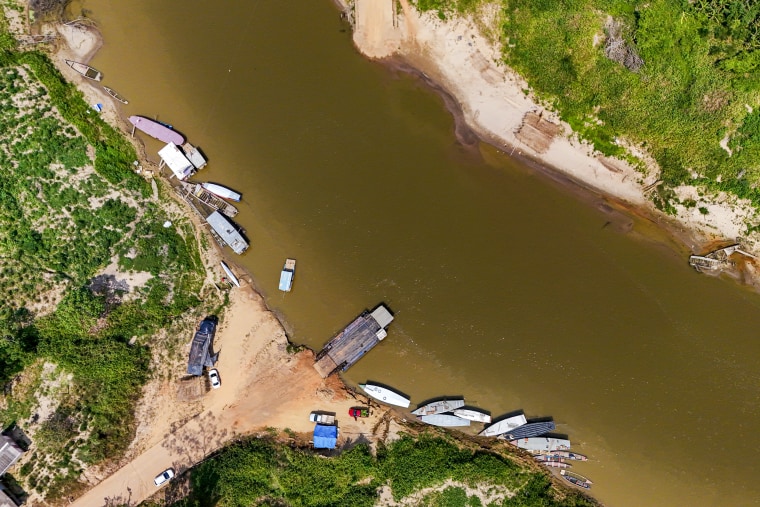 Boats in the community of Polo Benfinca sit on the bank of the Acre River.