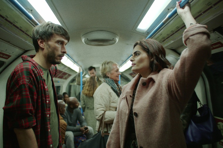 Teri and Donny in a scene filmed in a train