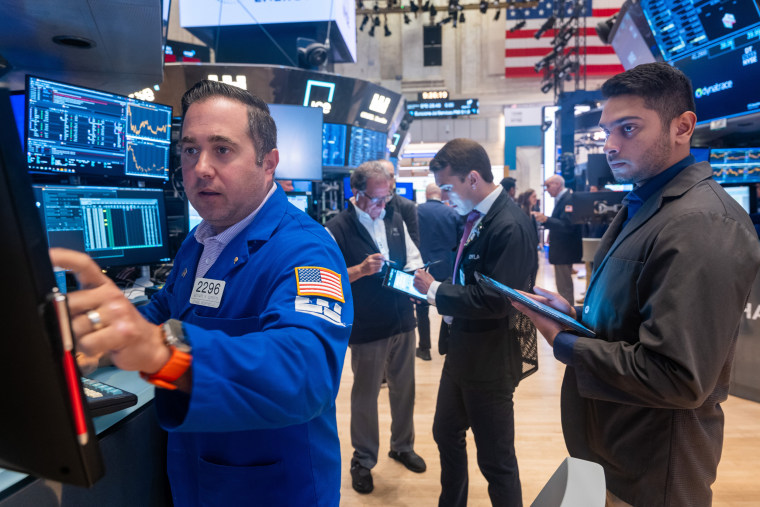 Traders work on the floor of the New York Stock Exchange on Aug. 5, 2024, in New York City.