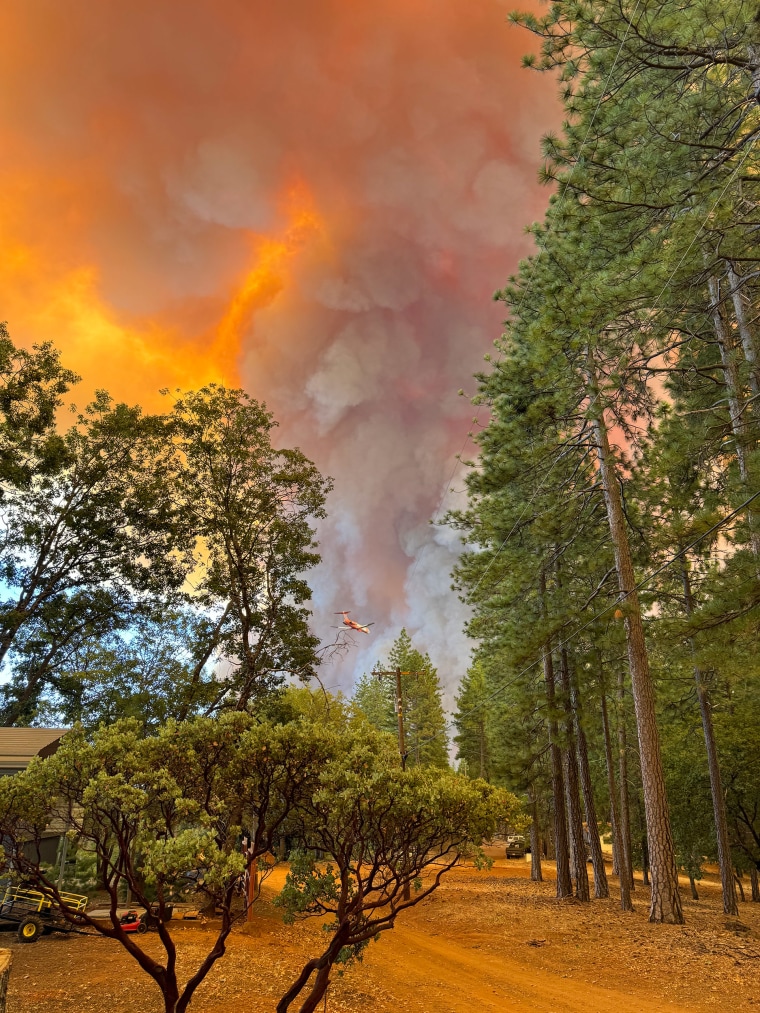 Ken Baker initially stayed behind to try to fight the fire at his property. Eventually, fire crews opened a path for him to flee in his vehicle. 