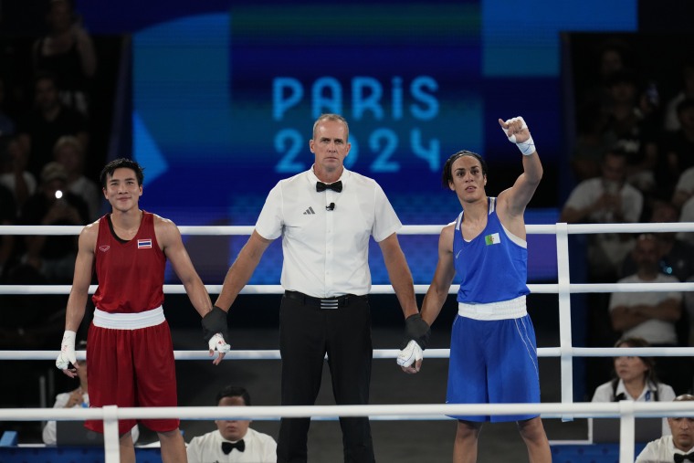 Imane Khelif of Algeria reacts after defeating Janjaem Suwannapheng of Thailand in the women's 66 kg boxing semi-final at the Olympics on August 6, 2024 in Paris.