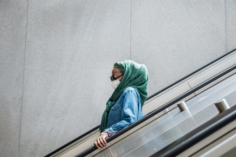 A masked commuter on the metro in Washington