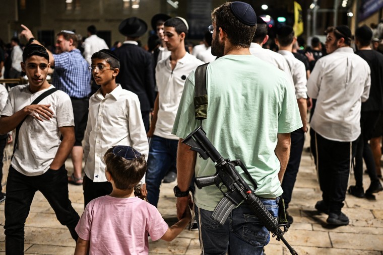 Commemorated under the Hebrew calendar as the Ninth of Av, worshippers gather at the Wailing Wall, the last remaining vestige of the Second Temple, in Jerusalem's Old City. 