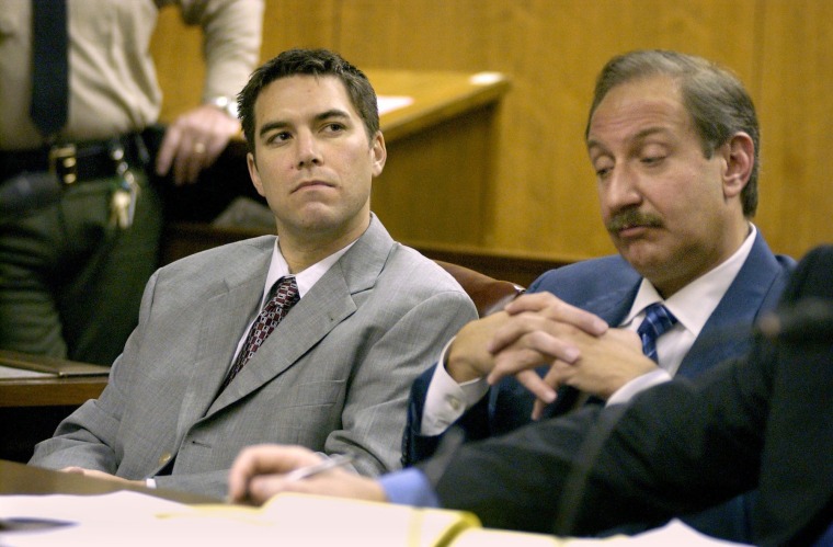 Peterson and Geragos at a court table