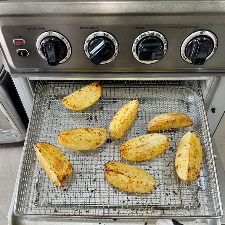 Potatoes on a tray after being cooked with a Cuisinart air fryer.