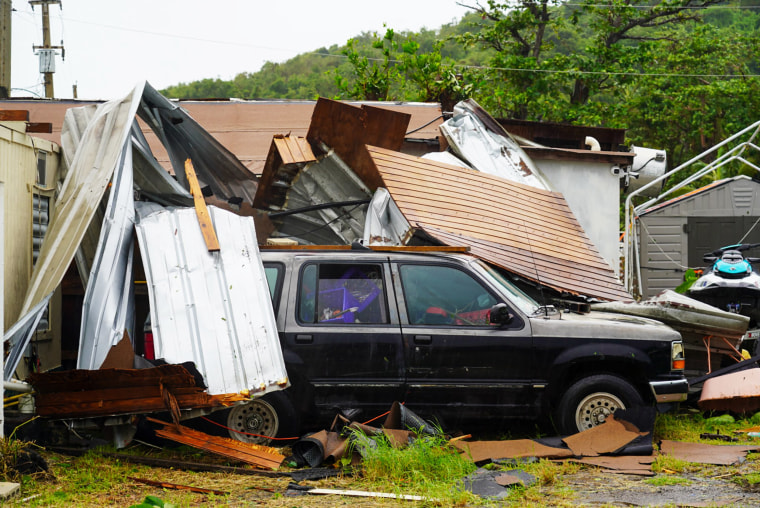 Typhoon Ernesto strengthens and strikes towards Bermuda after lashing Puerto Rico