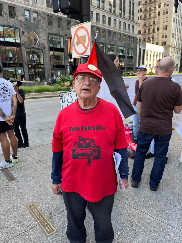 Neal Resnikoff, 88, joined demonstrators in downtown Chicago on Sunday.