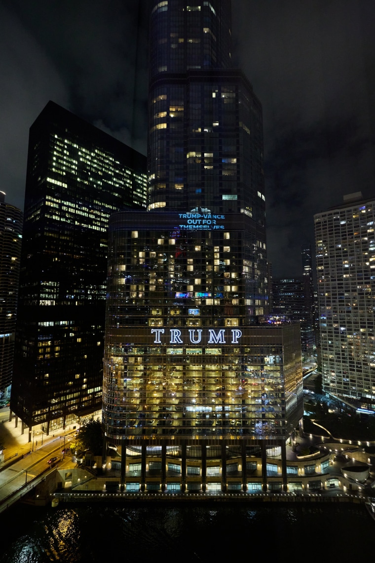 The Democratic National Committee projects images on Trump International Hotel in Chicago ahead of their convention in Chicago this week on August 18, 2024 in Chicago, Illinois. 