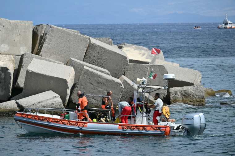 Divers of the Vigili del Fuoco, the Italian Corps. of Firefighters, near Palermo