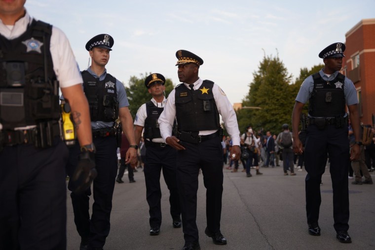 Center Superintendent Larry Snelling orders a squad of officers ahead of Thursday's march.