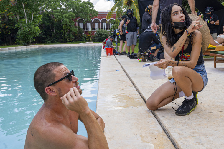 Actor Channing Tatum, left, and director Zoë Kravitz by the pool on the set of "Blink Twice."