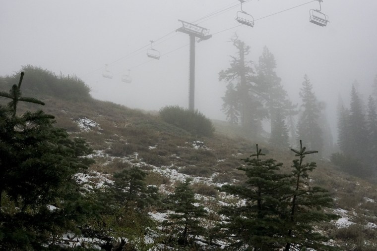 A coating of snow is seen below ski lifts at Sugarbowl Ski Resort in Donner Summit, Calif.