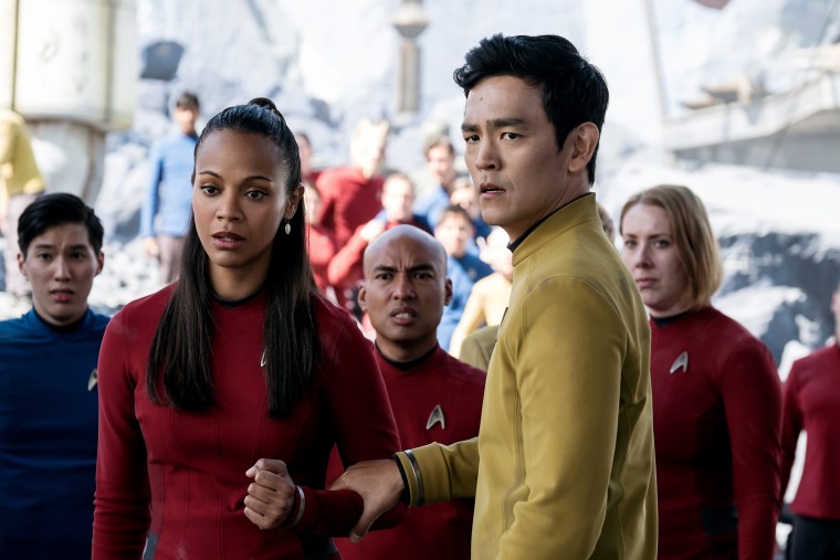 Zoe Saldana as Uhura, John Cho as Sulu