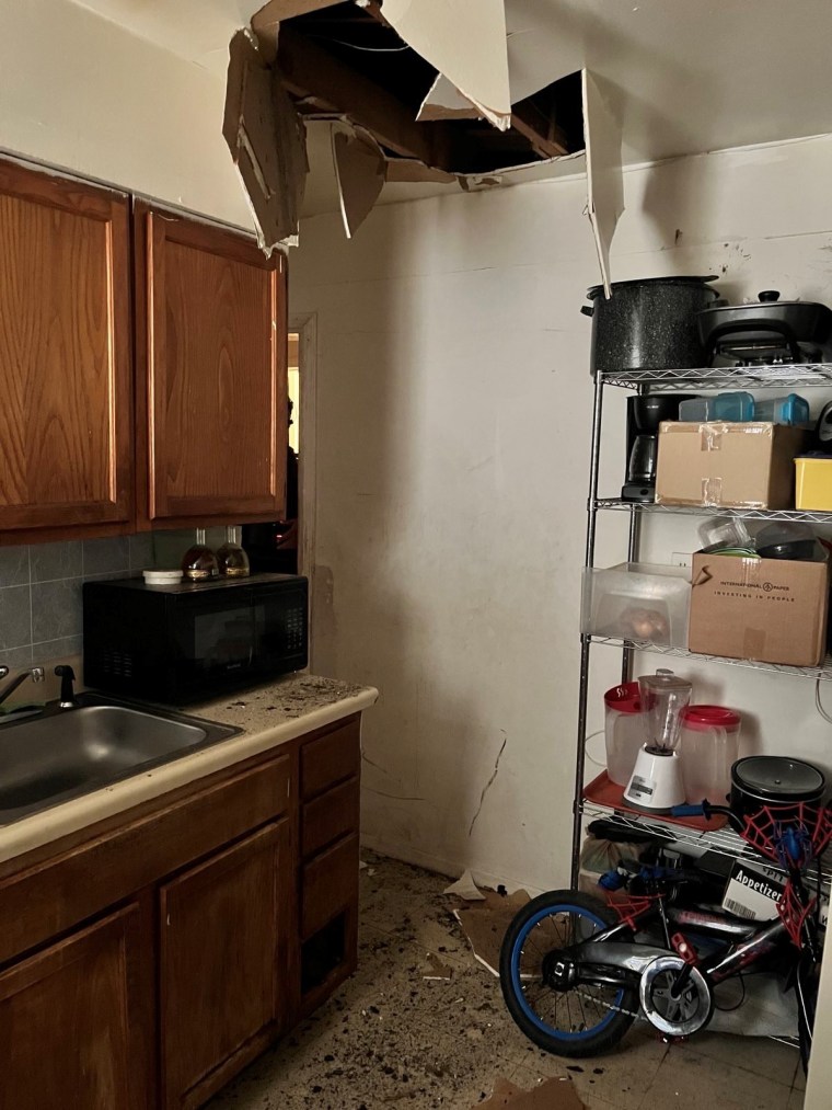 The broken ceiling inside the kitchen