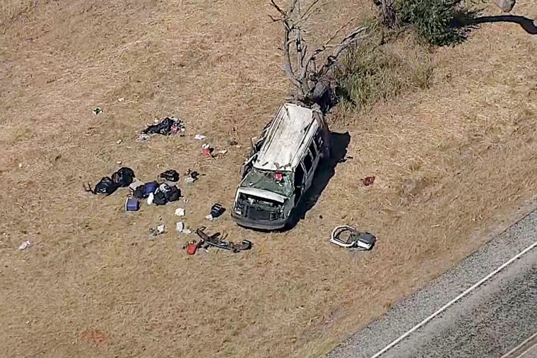 Officials said 13 of the 14 people inside the passenger van were ejected during the crash.