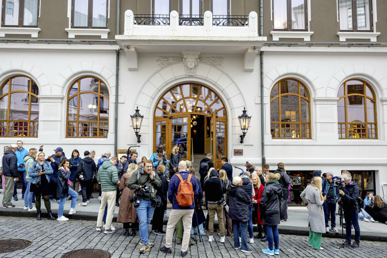 Media gather in front of Hotel 1904 in Alesund.