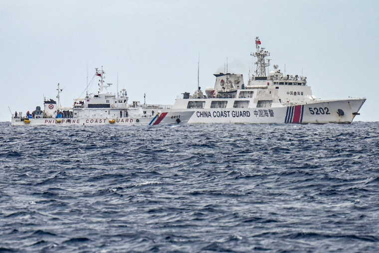 A China Coast Guard ship and the Philippine Coast Guard ship .