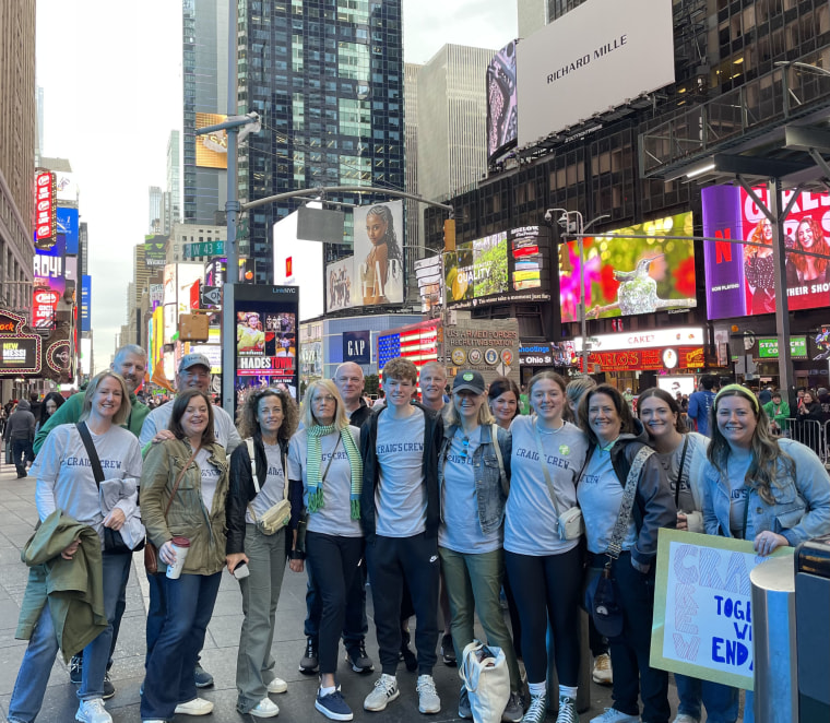 Melanie Craig with group of people in nyc