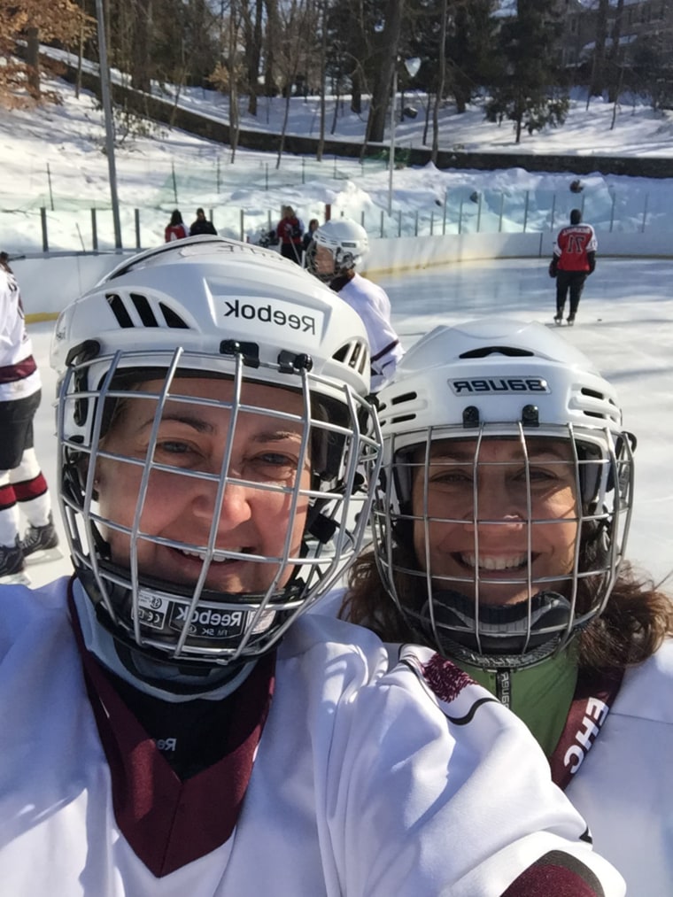 Melanie Craig with friend playing hockey