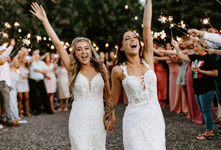 Couple Reacts To Wearing The Same Wedding Dress