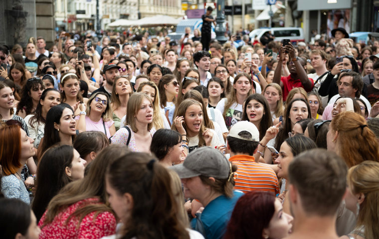 Taylor Swift fans sing together on Stephansplatz in Vienna, Austria.