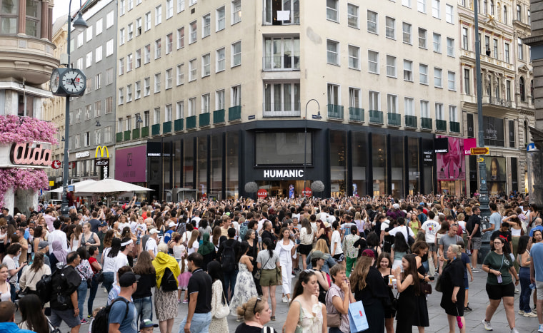 Taylor Swift fans sing together on Stephansplatz in Vienna, Austria.