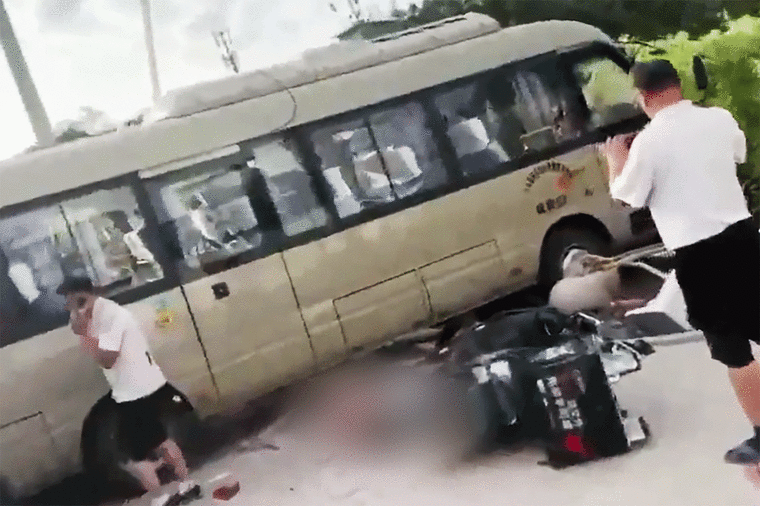 China bus crash outside middle school leaves 11 dead, 13 injured