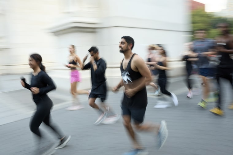 Runners leave Washington Square Park as part of Lunge Run Club Singles run on Aug. 28, 2024 in New York.