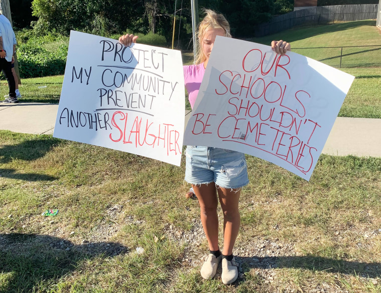 student signs message school shooting aftermath