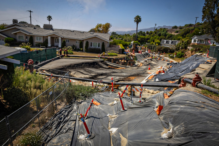 In California city hit by landslides, slipping may not be stoppable