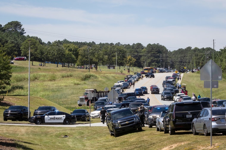 Law enforcement arrive at Apalachee High School in Winder, Georgia, on Sept. 4, 2024, as a shooting was reported. 