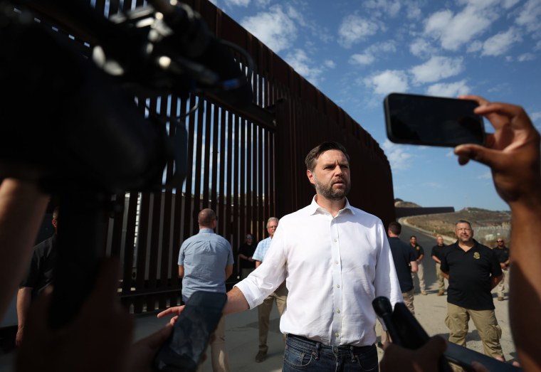 Republican vice presidential nominee Sen. J .D. Vance speaks to reporters in front of the border wall with Mexico on Sept. 06, 2024 in San Diego, California. 