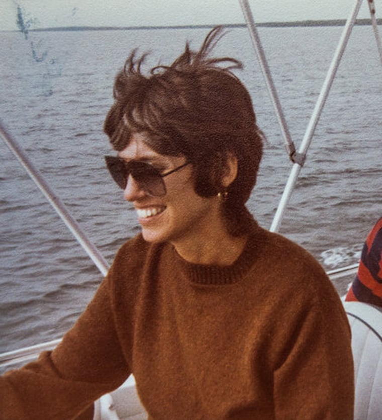 Jessica Leeds smiles while on a boat on the water