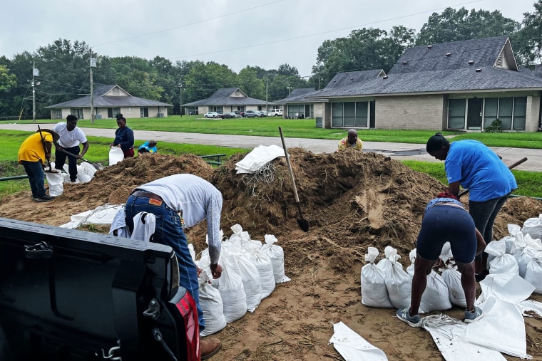 Residents fill sand bags in Baton Rouge, La., ahead of Tropical Storm Francine on Tuesday, Sept. 10, 2024.