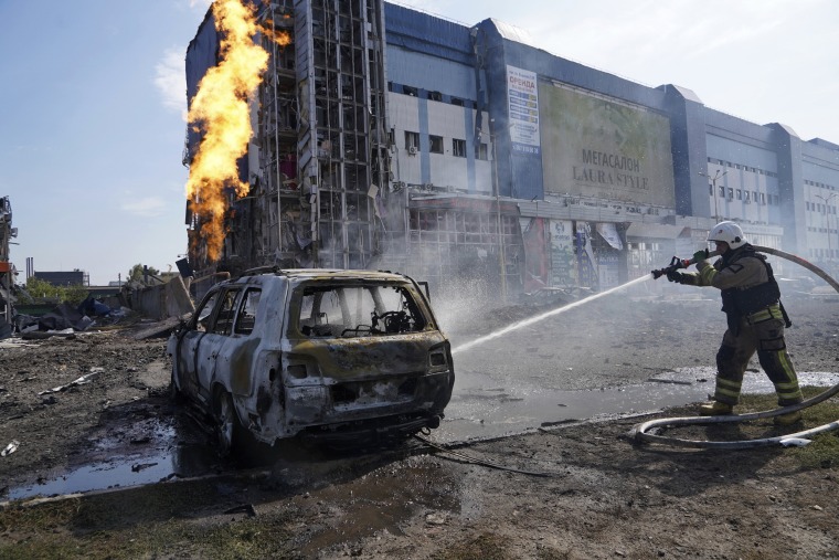 Firefighters extinguish a fire after a Russian missile attack in Kharkiv, Ukraine, on Sept. 1, 2024. 