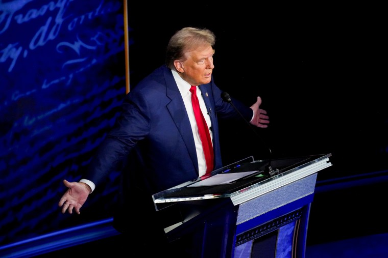 Donald Trump gestures as he speaks