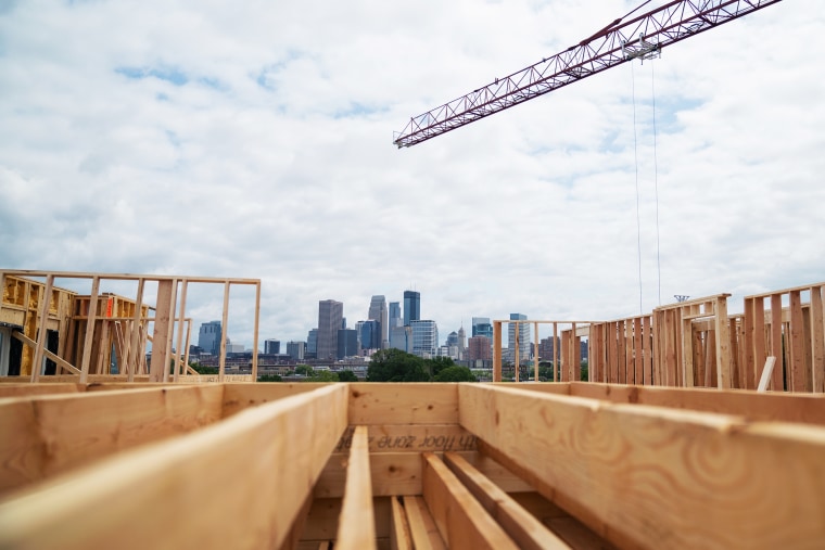 A construction site with a view of Minneapolis