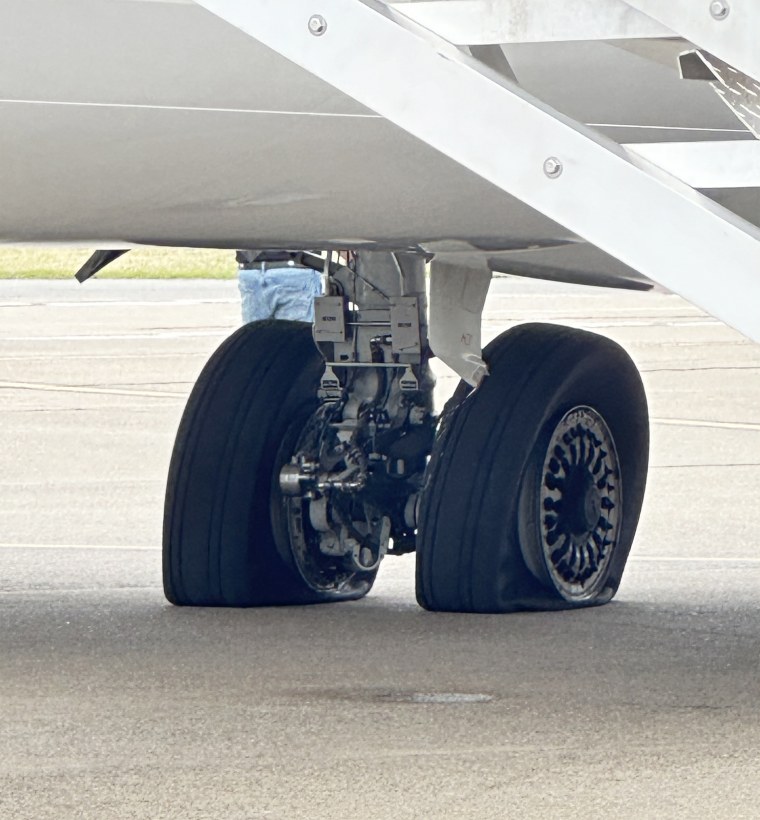 alaska airlines tire damage aborted flight